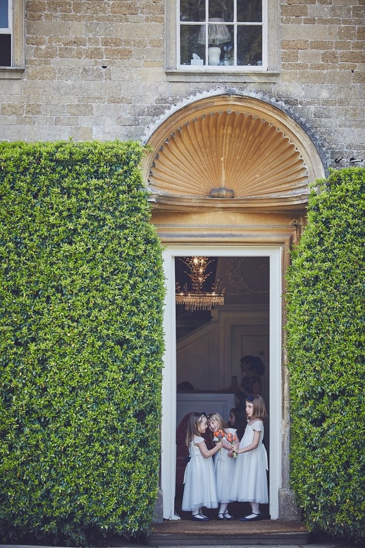 flower girls at relaxed wedding photography Babington House Somerset