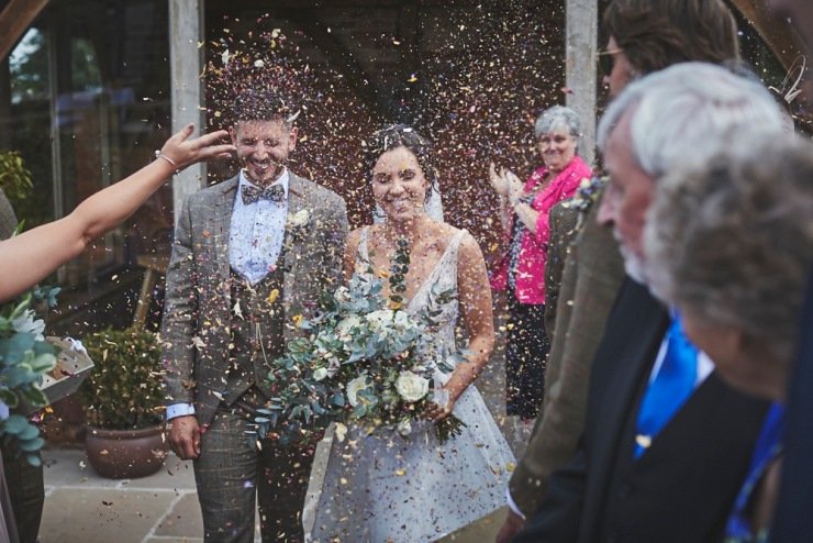 confetti throw photography Upton Barn and walled garden Devon