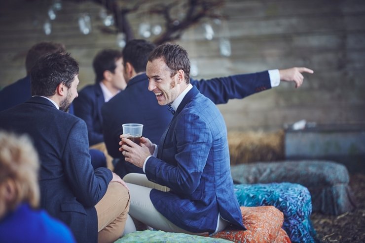 natural wedding photo of happy guest at eco wedding at East Soar Farm in Devon