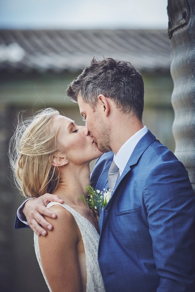 natural wedding photo of couple at eco wedding at East Soar Farm in Devon