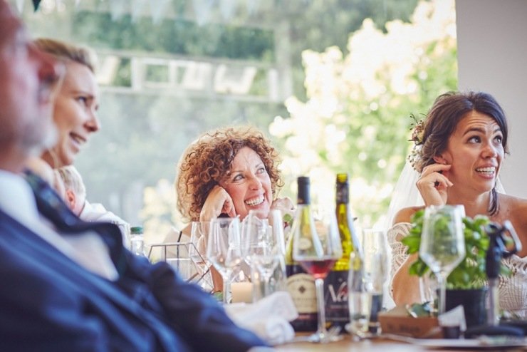 relaxed wedding photography of speeches at Kingston Estate Devon